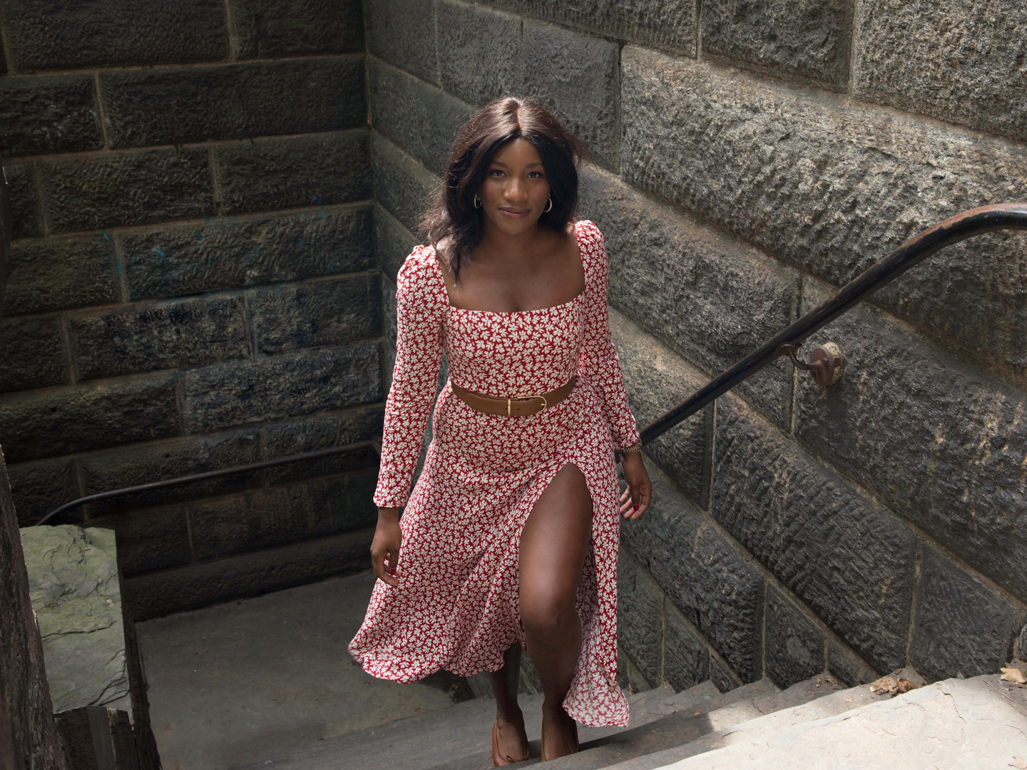 Danielle is wearing the SIGMUND in GRENADINE.